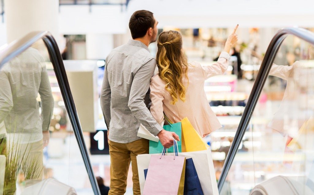 Couple in a mall with shopping bags