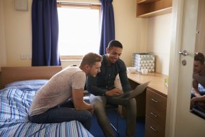 Students in a bedroom of an accommodation