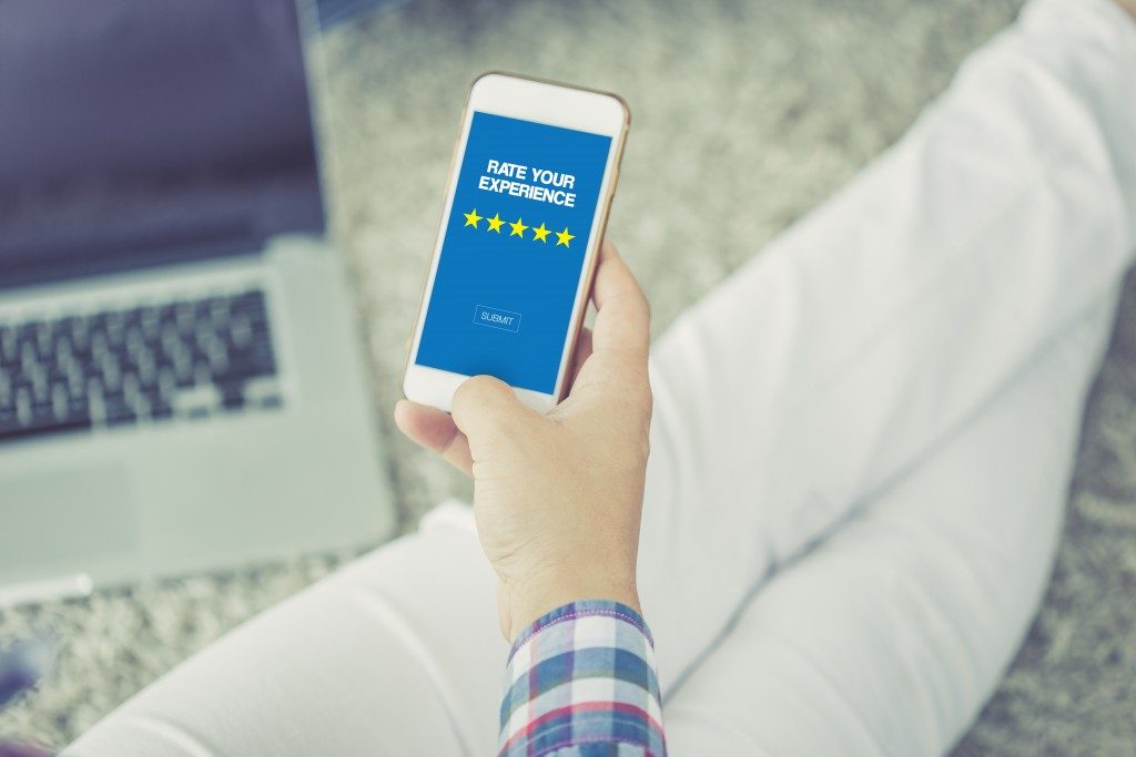 Customer satisfaction concept on smartphone screen