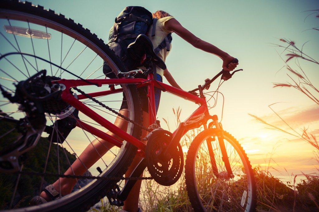 hiker with his bicycle