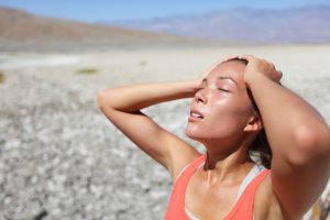 dehydrated woman under the sun