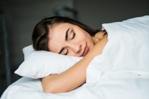 woman sleeping on the bed