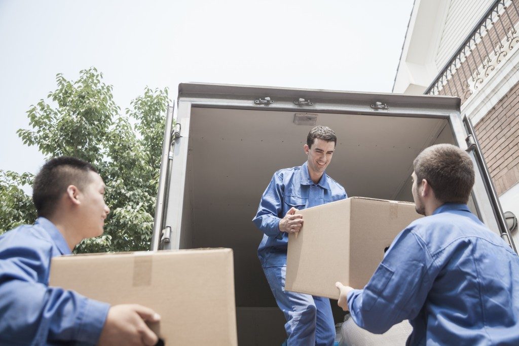 Movers unloading the truck