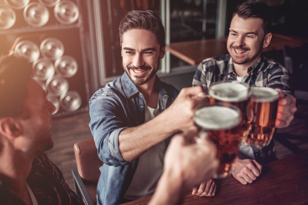 friends drinking at a pub