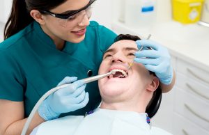man having dental treatment