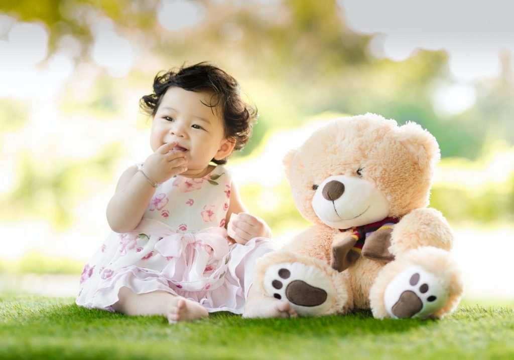baby and teddy bear